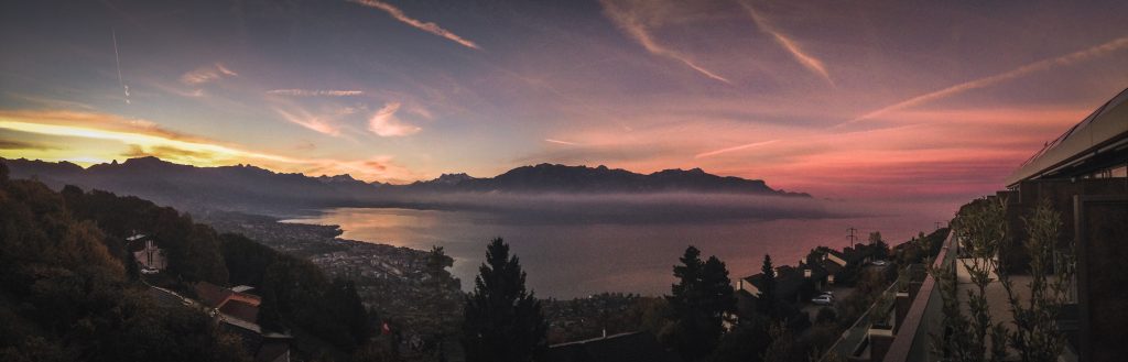 Sunrise over the Swiss Alps and Lake Geneva