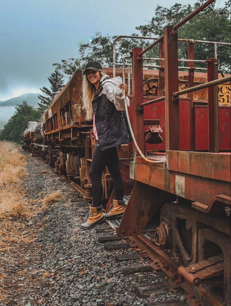 Hanging off an old train in Garibaldi