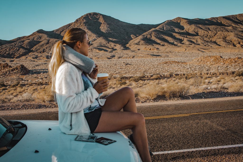 Me sitting on the jeep in Death Valley National Park