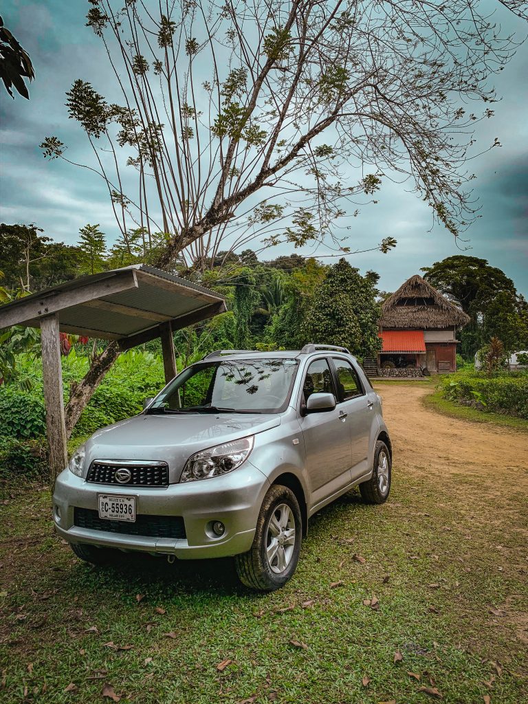 Our little compact suv parked at Cotton Tree Lodge