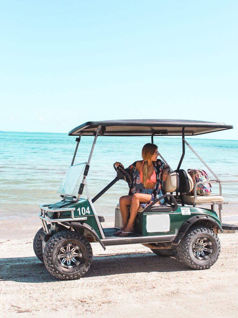 Me in my golf cart on the beach