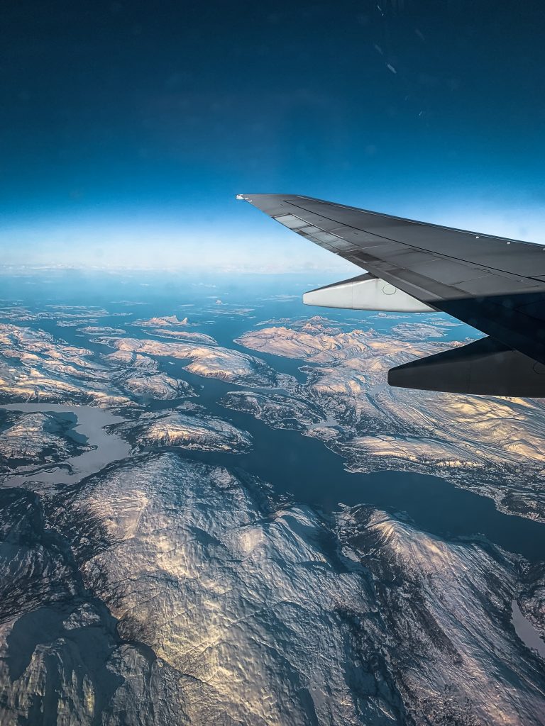 Plane wing flying into Tromso, Norway