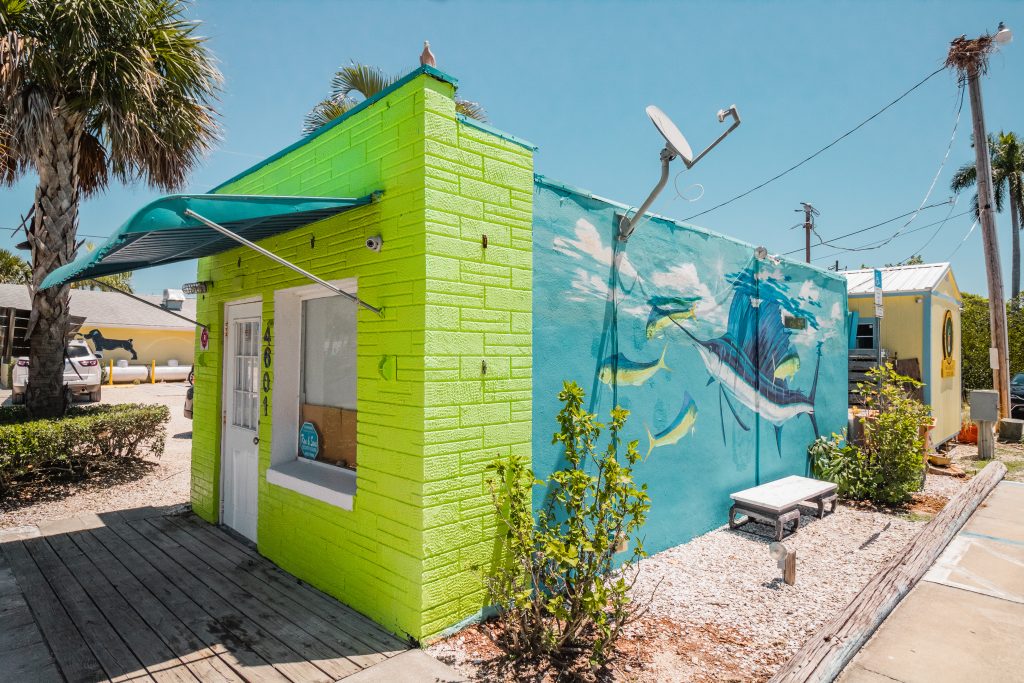 A colorful building with a shark mural in Matlacha, Florida