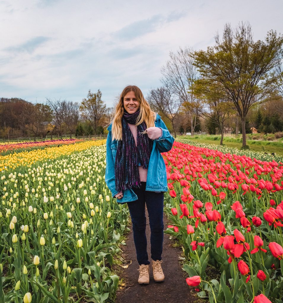 Me in a row of red and white tulips