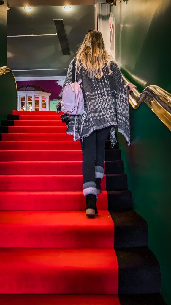 Me walking up the red carpet stairs in the Grand Hotel