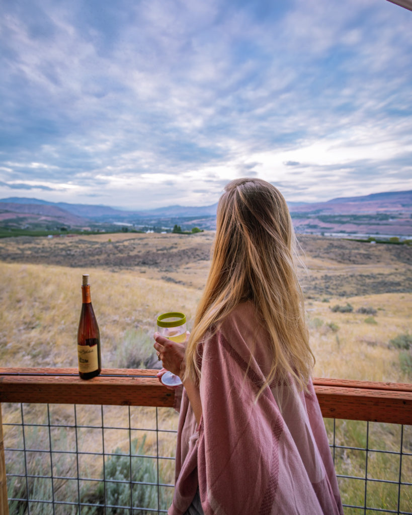 Drinking Wine on the Deck of the Glamping Tent